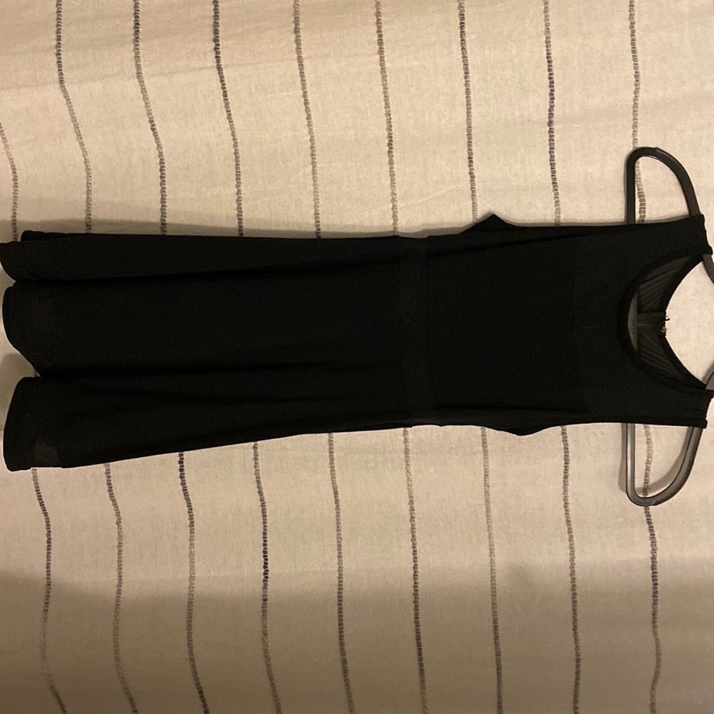 black dress with mesh at top and strip in middle
